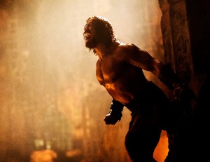 The Rock flexes mental and physical muscles in this climactic scene from "Hercules". Photo by David James. 