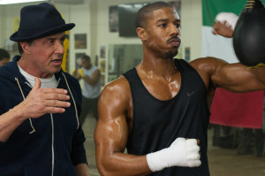 Rocky (Sylvester Stallone) trains Adonis Creed (Michael B. Jordan) in "Creed". Photo by Barry Wetcher.