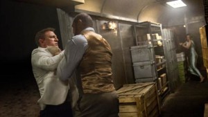 James Bond (Daniel Craig) and Mr. HInx (Batista) battle it out as Madeleine Swann (Léa Seydoux) looks on in "Spectre". Photo courtesy Metro-Goldwyn-Mayer Pictures/Columbia Pictures/EON Productions.