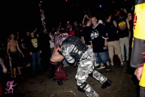 Stryknyn and a riot gear guy keep the pit going. Photo by Get Hashley Photography.