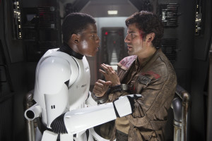 Finn (John Boyega) and Poe Dameron (Oscar Isaac) plot their escape from the First Order. Photo by David James.